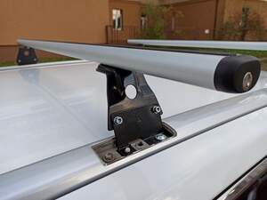 Багажник AMOS BETA на штат.места TOYOTA Avensis III kombi 5дв 2009-2018 (аэродинамич.дуги с замком)