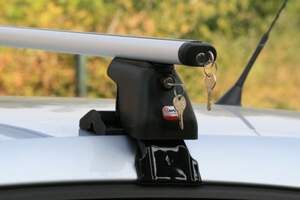 Багажник DROMADER креп.за двер.проемы VOLKSWAGEN Touran MPV 5дв 2003-2009 (аэродинамич.дуги с замком)