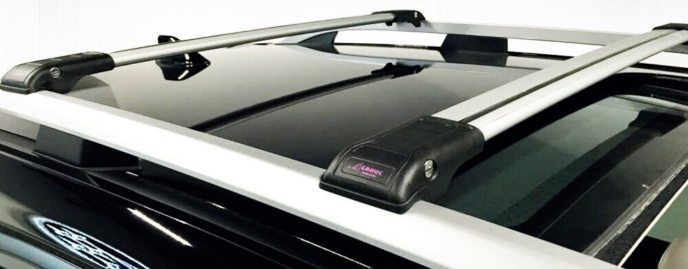 Багажные поперечины WingCarrier V1 на рейлинги HYUNDAI TUCSON 2004-2015 с замком, серебристые Багажные поперечины WingCarrier V1 на рейлинги HYUNDAI TUCSON 2004-2015 с замком, серебристые