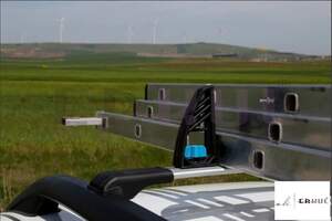 (а) Фиксаторы грузов (высота 15 см, комплект 4 шт.)для аэродинамических поперечин с креплением в верхний паз